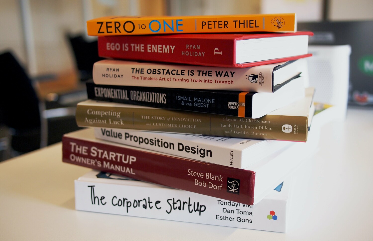 Entrepreneur and creativity books on a desk